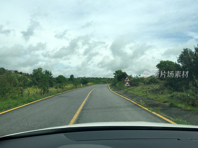 Driving on mountain or country asphalt road